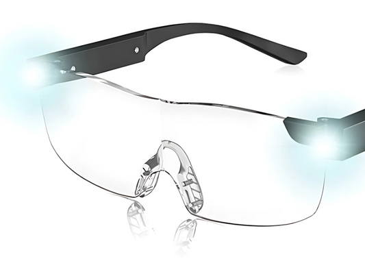 Gafas lupa con iluminación LED integrada, ideales para trabajos de precisión y lectura en condiciones de poca luz en Madrid