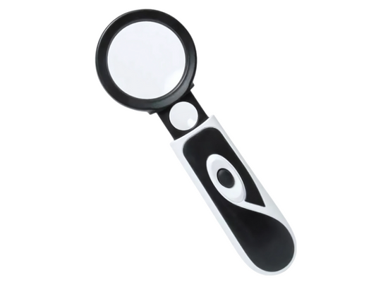 Lupa de mano con luz LED y aumentos de 3.5X y 20X en Madrid, ideal para lectura, electrónica y tareas detalladas.