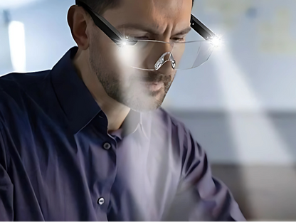 Gafas especiales con lupa de aumento y sistema de iluminación LED ajustable, montura cómoda y manos libres.