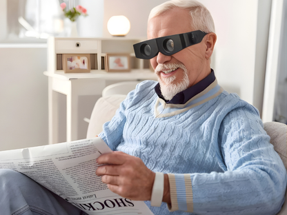 Lupa binocular ajustable con aumento óptico para tareas de precisión y baja visión.