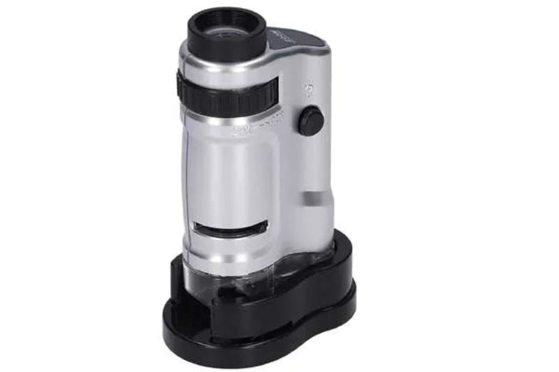 Microscopio portátil con zoom de 20x-40x, diseño compacto y fácil de usar, perfecto para observación y estudios detallados.