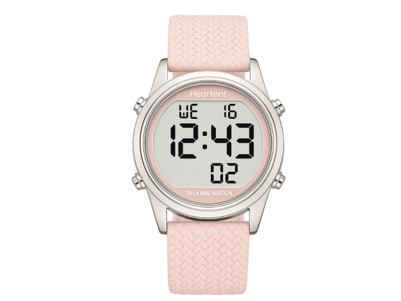 Reloj parlante digital con correa rosa y números grandes, disponible en Madrid.