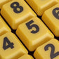 Teclado amarillo con teclas grandes y letra Ñ para personas con baja visión en Madrid