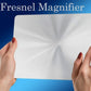 Lupa folio tipo Fresnel ampliando texto impreso en Madrid