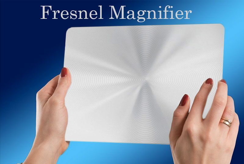 Lupa folio tipo Fresnel ampliando texto impreso en Madrid