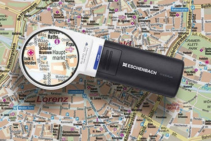 Lupa Mobilux LED Eschenbach con aumento 2.5x y luz LED integrada, perfecta para tareas de precisión en Madrid.